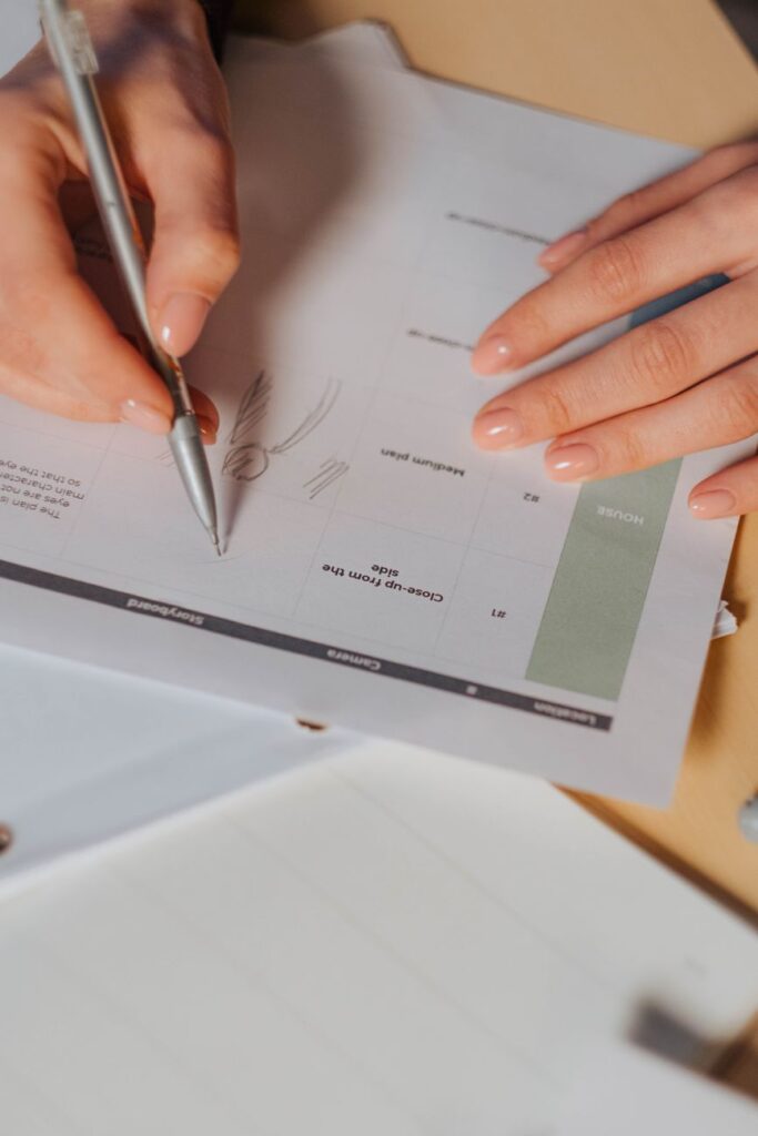 woman filling storyboard in