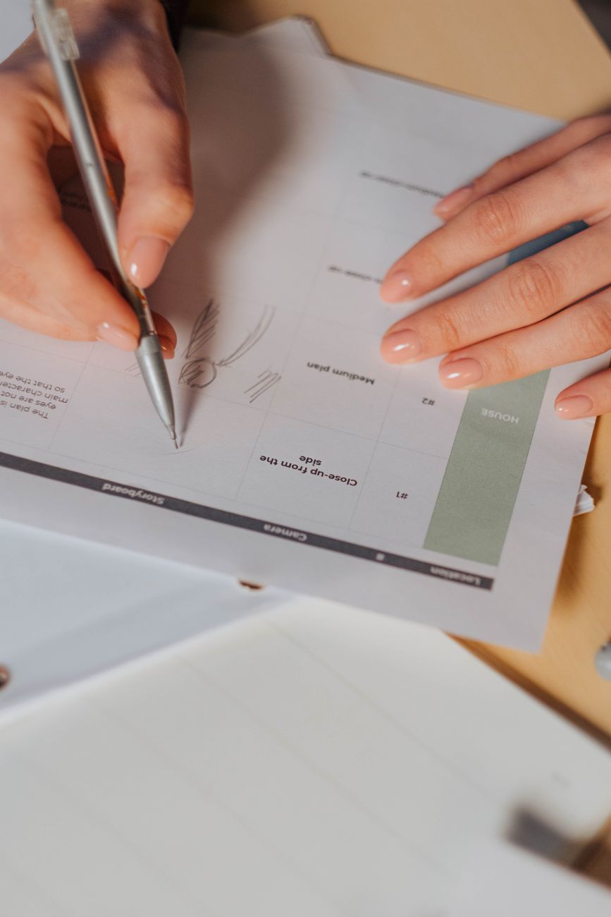 woman filling storyboard in